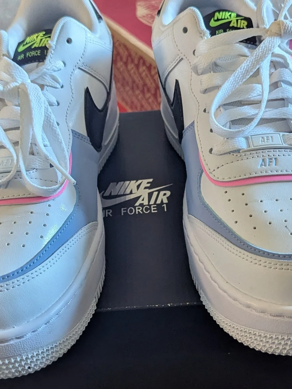 Nike women's White Sneakers with Black Swoosh and Pink Trim